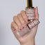 hands wearing 2442 Catch Me Sheering Gel & Polish Duo by DND DC