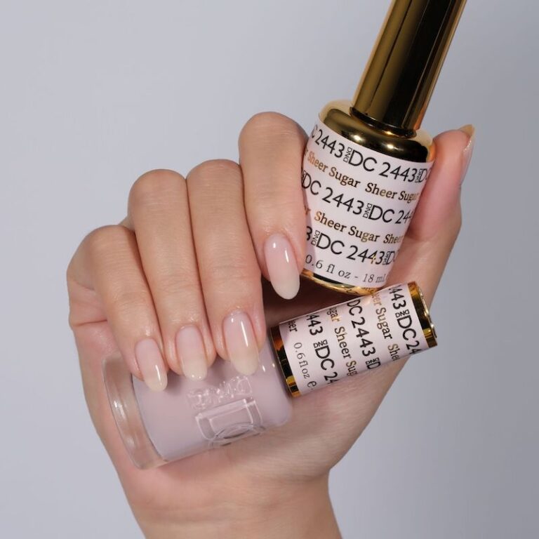 hands wearing 2443 Sheer Sugar Gel & Polish Duo by DND DC