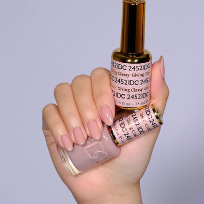 hands wearing 2452 Giving Classy Gel & Polish Duo by DND DC