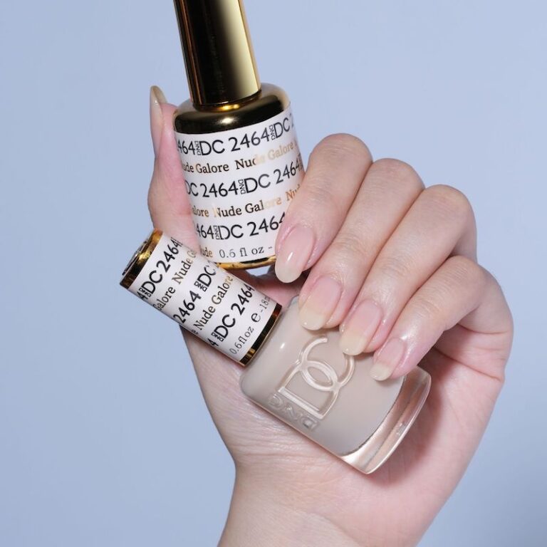 hands wearing 2464 Nude Galore Gel & Polish Duo by DND DC