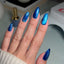hands wearing DND DC Cat Eye Galactic Sapphire