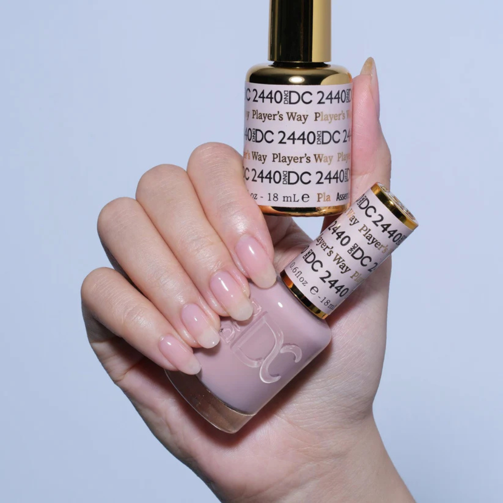 Hands wearing DND DC Gel 2440 Player's Way