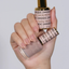 Hands wearing DND DC Gel 2442 Catch Me Sheering
