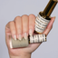 Hands wearing DND DC Gel 2449 Barely There