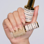 Hands wearing DND DC Gel 2450 Sheer Glow2450 Sheer Glow