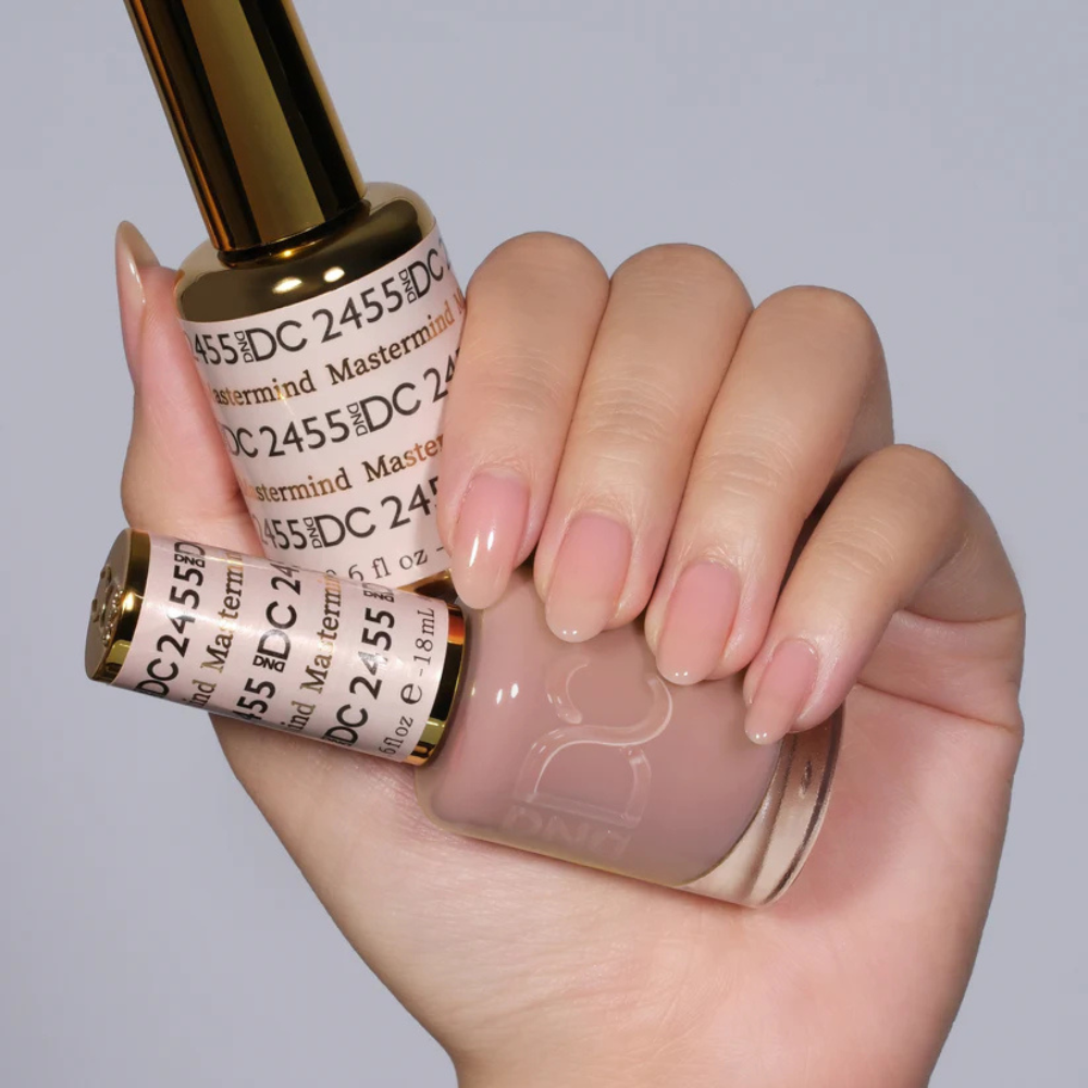 Hands wearing DND DC Gel 2455 Mastermind