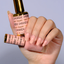 Hands wearing DND DC Gel 2458 Daiquiri