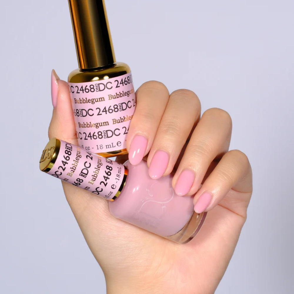 Hands wearing DND DC Gel 2468 Bubblegum