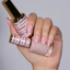 Hands wearing DND DC Gel 2469 C'est La Vie