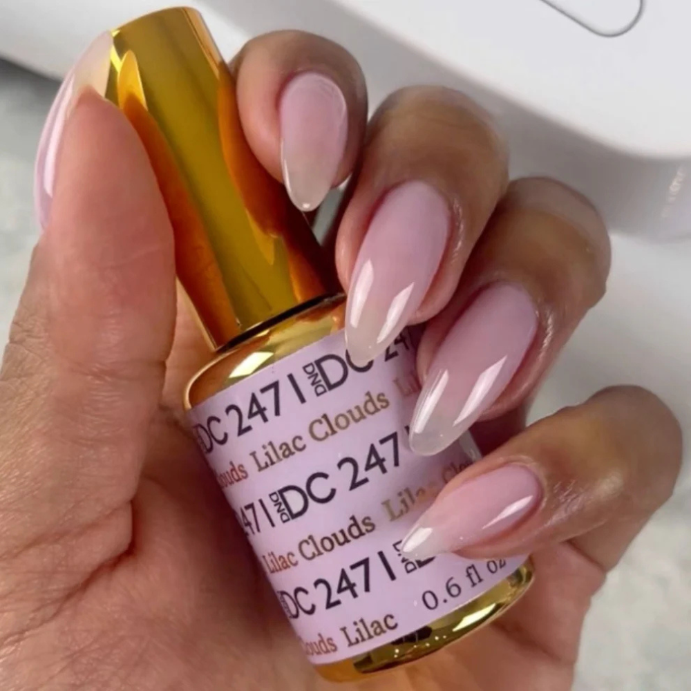 Hands wearing DND DC Gel 2471 Lilac Clouds