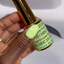 Hands wearing DND DC Gel 2513 Happy Go Lucky
