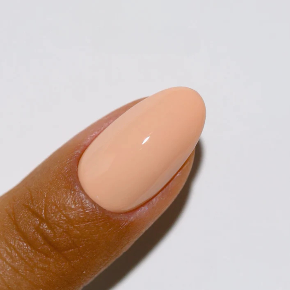Hands wearing DND DC Gel 293 Tres Leches