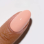 Hands wearing DND DC Gel 297 Pink Bliss