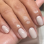 Hands wearing DND DC Gel 301 Half Moon