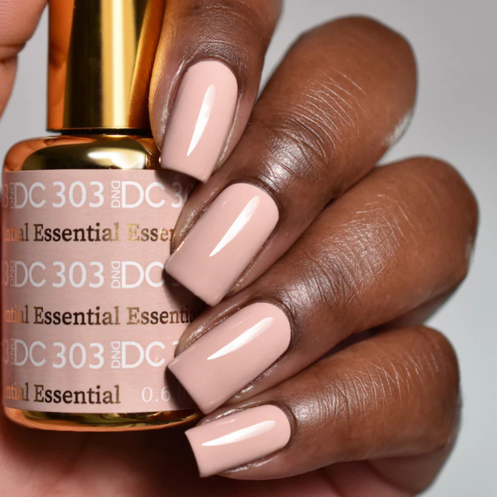 Hands wearing DND DC Gel 303 Essential