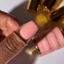 Hands wearing DND DC Gel 304 Ice-Cream Sundae