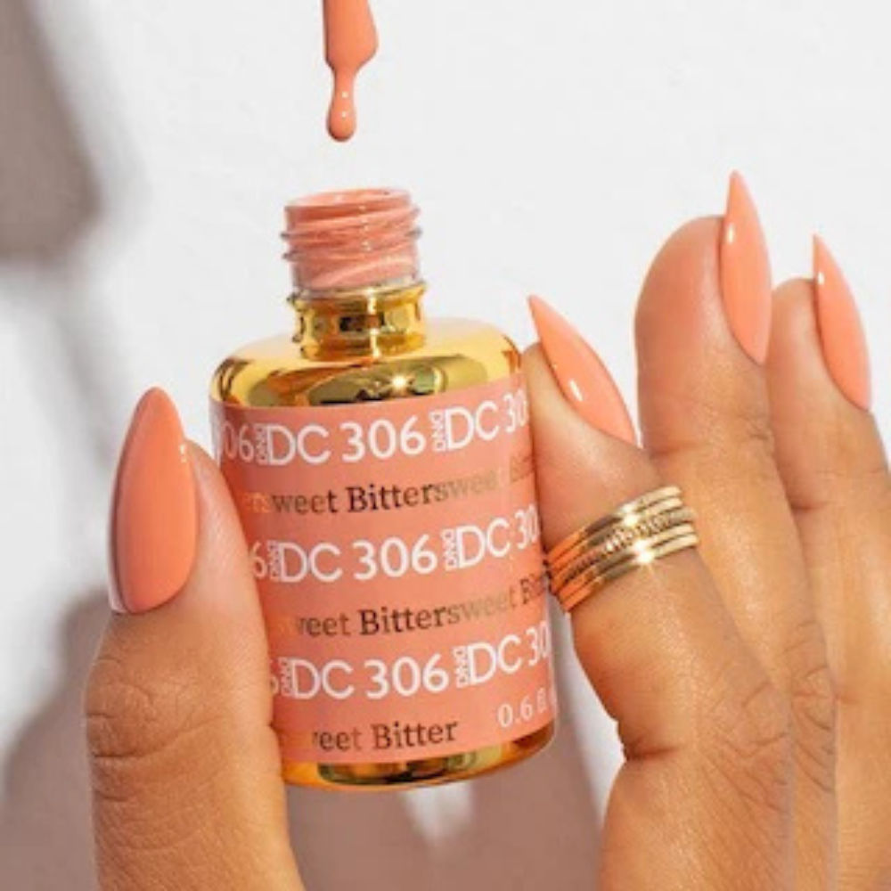 Hands wearing DND DC Gel 306 Bittersweet