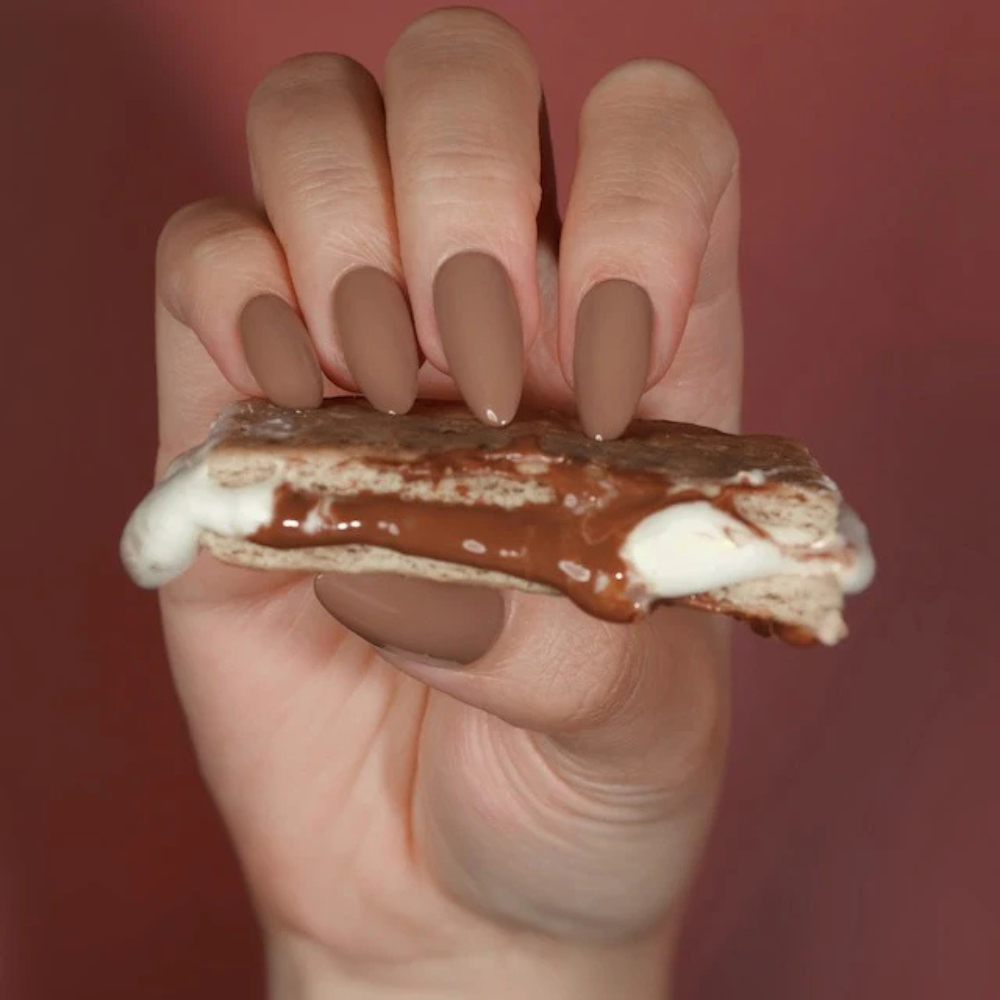 Hands wearing DND DC Gel 316 S'mores