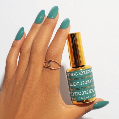 Hands wearing DND DC Gel 322 Playground