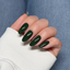 Hands wearing DND DC Gel 326 Nightrider
