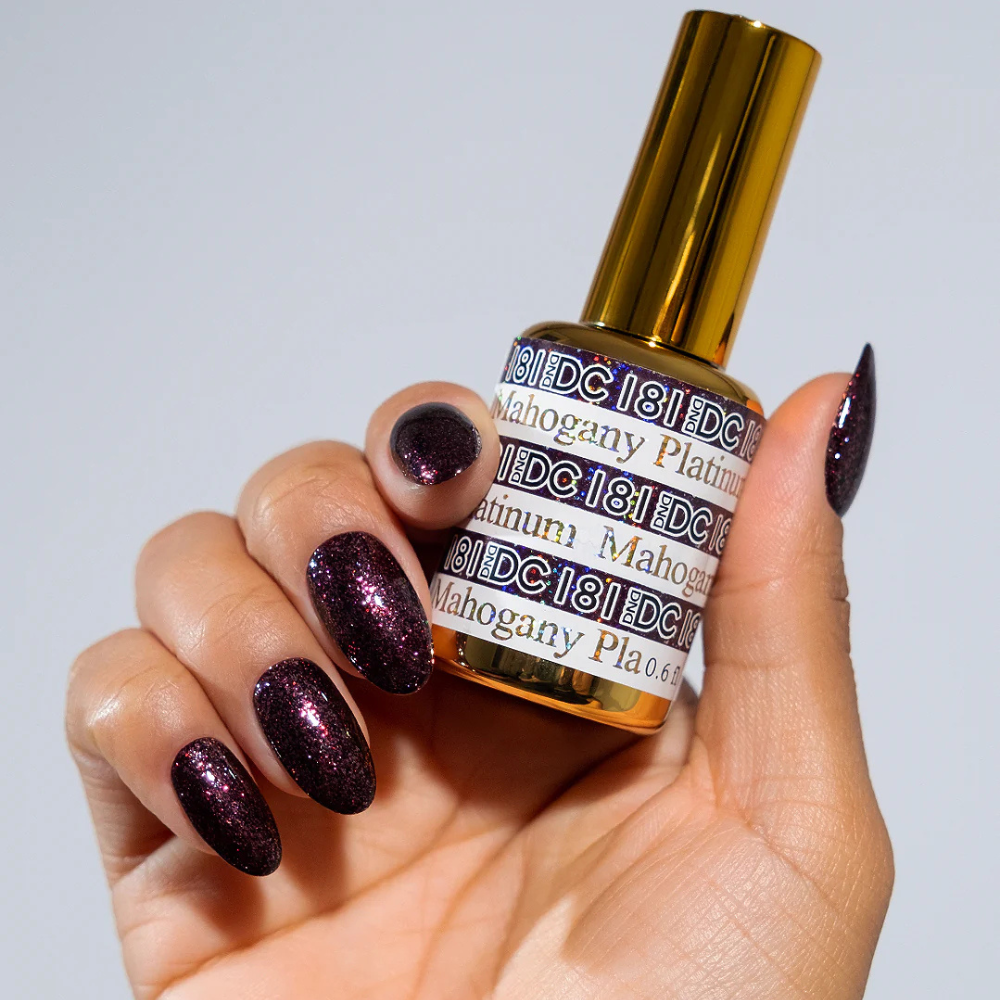 hands wearing DND DC181 Mahogany Platinum
