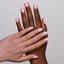 hands wearing 130 Delicate Blush Diva Gel & Polish Duo by DND