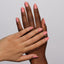 hands wearing 169 Tajin Diva Gel & Polish Duo by DND