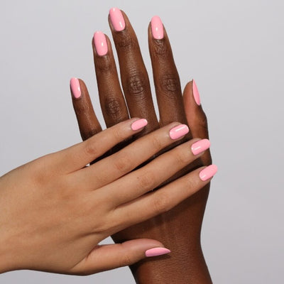 hands wearing 171 Bella Pink Gel & Polish Diva Duo by DND