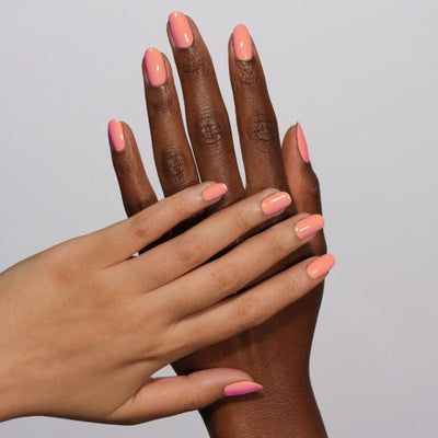 hands wearing 174 Cool As A Coral Gel & Polish Diva Duo by DND