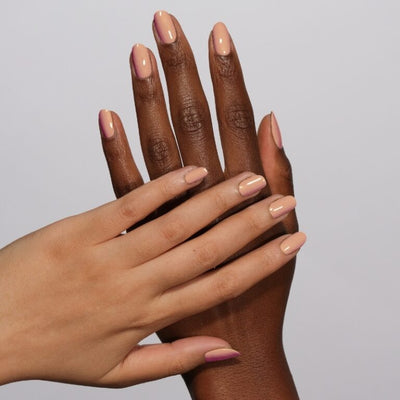 hands wearing 176 Nude Leather Gel & Polish Diva Duo by DND