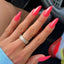 hands wearing DND Diva Juicy Fruit 213 gel polish