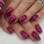 hands wearing DND Duo gel polish 630 Boysenberry