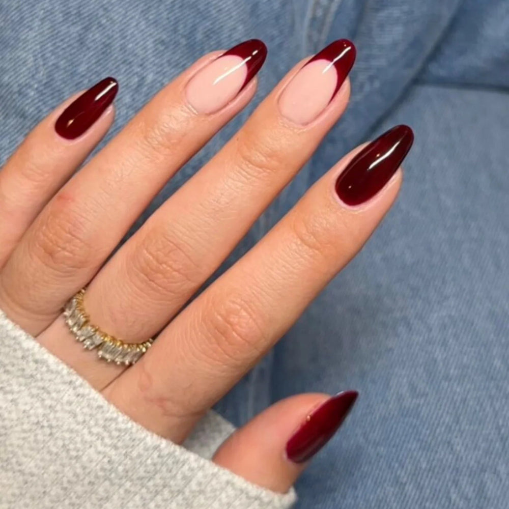 hand wearing DND Duo gel polish 633 Garnet Red