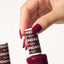 hand wearing DND Duo gel polish 634 Reddish Purple