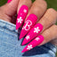 Hands wearing DND Duo gel polish 640 Barbie Pink