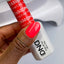hand wearing DND Duo 650 floral coral gel polish