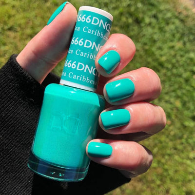 hands wearing DND Duo gel polish 666 Caribbean Sea