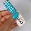 hand wearing DND Duo gel polish 669 Fierce Sapphire