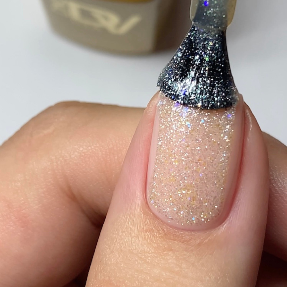 hands wearing 003 Mercury Blues Gel & Polish Diva Duo by DND