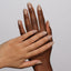 Hands wearing 983 Slinky Taupe Duo by DND