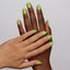 Hands wearing 996 Soda-Lightful Lime Gel & Polish Duo by DND