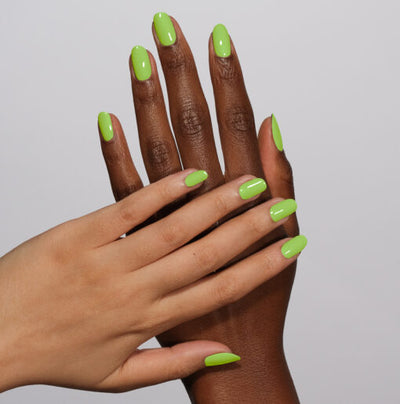 Hands wearing 996 Soda-Lightful Lime Gel & Polish Duo by DND