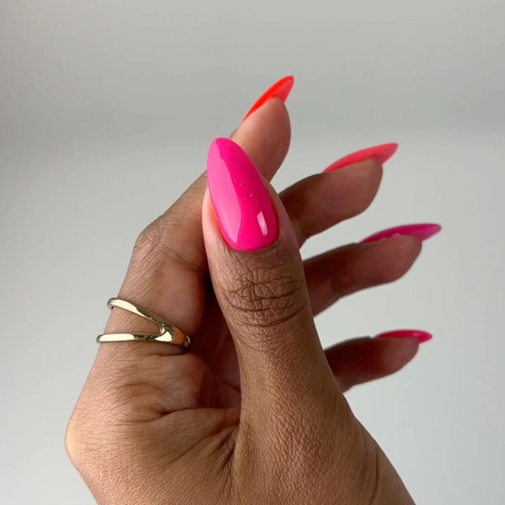 hands wearing DND DC Gel - 004 Pink Lemonade