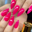 hands wearing DND DC Gel - 005 Neon Pink