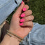 hands wearing DND DC Gel Polish 015 Pink Daisy
