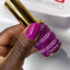 finger wearing DND DC Gel - 022 Magenta Rose
