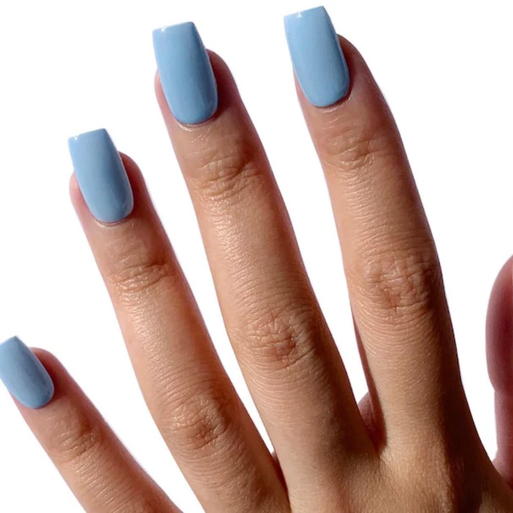 hands wearing DND DC Gel - 030 Aqua Blue