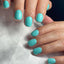 hands wearing DND DC Gel - 033 Nile Green