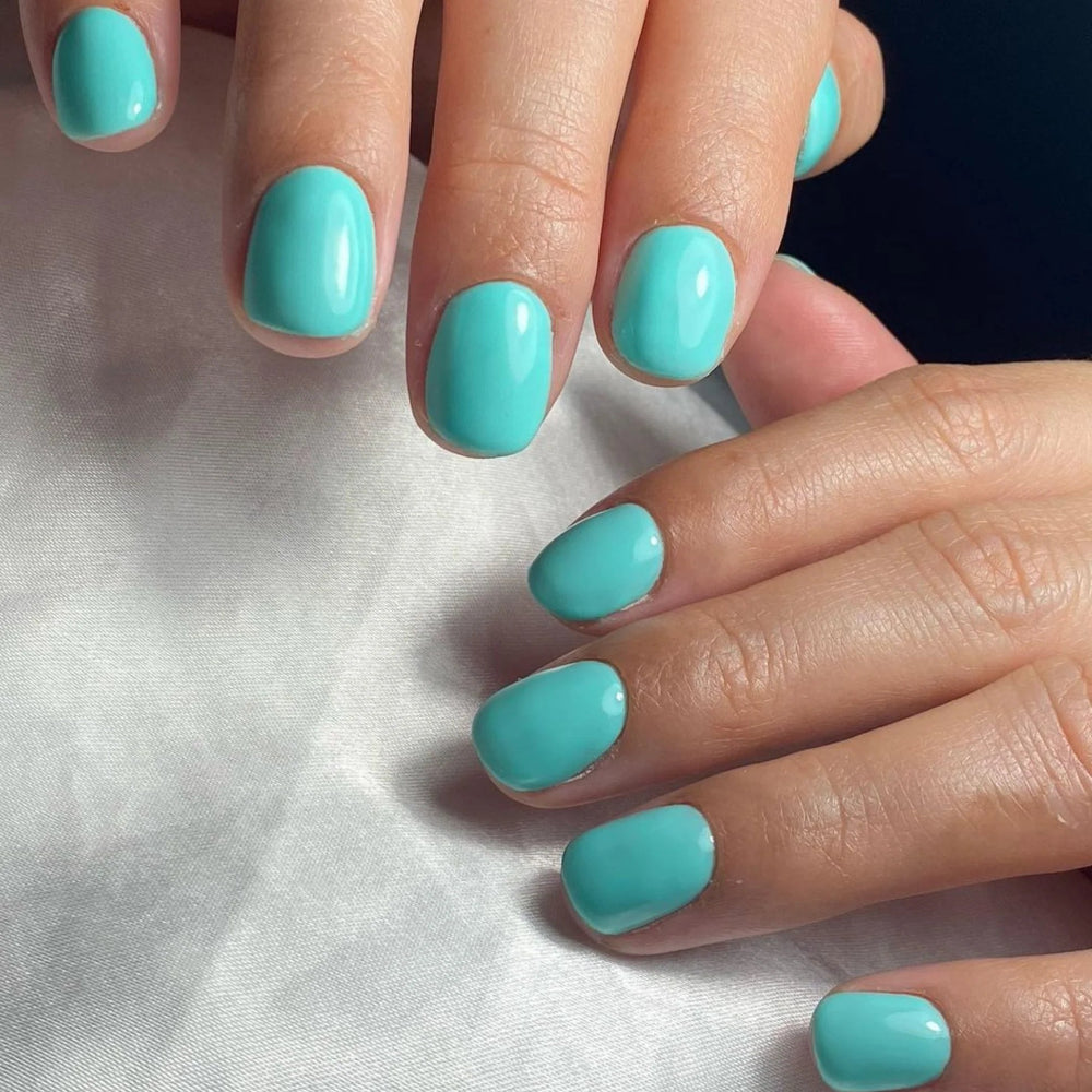 hands wearing DND DC Gel - 033 Nile Green