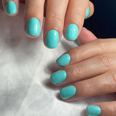 hands wearing DND DC Gel - 033 Nile Green
